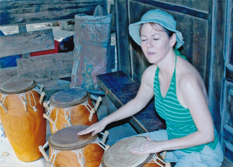 Linette Tobin playing Kpanlogo drum, Ghana 2009
